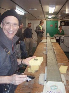 LARISSA chief scientist Eugene Domack prepares to sample the jumbo Kasten core recovered from Hugo Island Trough.