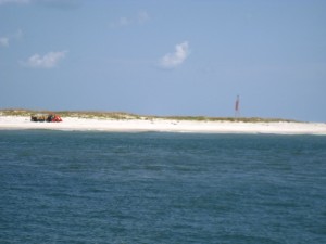 BP Cleanup crews on beaches, looking for oil in sediment
